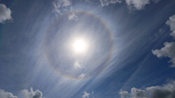 Wolken kijken: de sluierwolk: Kringen om de zon en regenbogen in de wolken