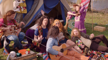 Hippies op Woodstock: Peace, love en lange haren