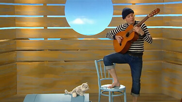 Schipper speelt gitaar