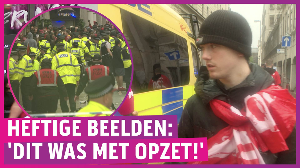 BIZAR: Man rijdt in op feestende Liverpool-fans!